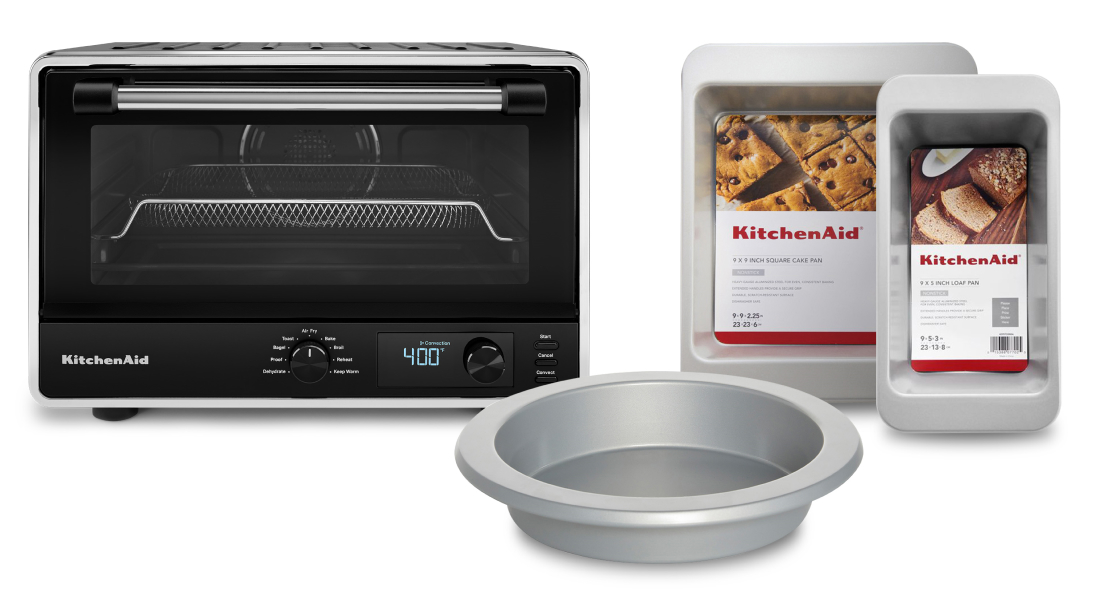 A KitchenAid® countertop oven and bakeware set.