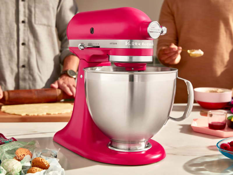 A red KitchenAid® stand mixer on a countertop