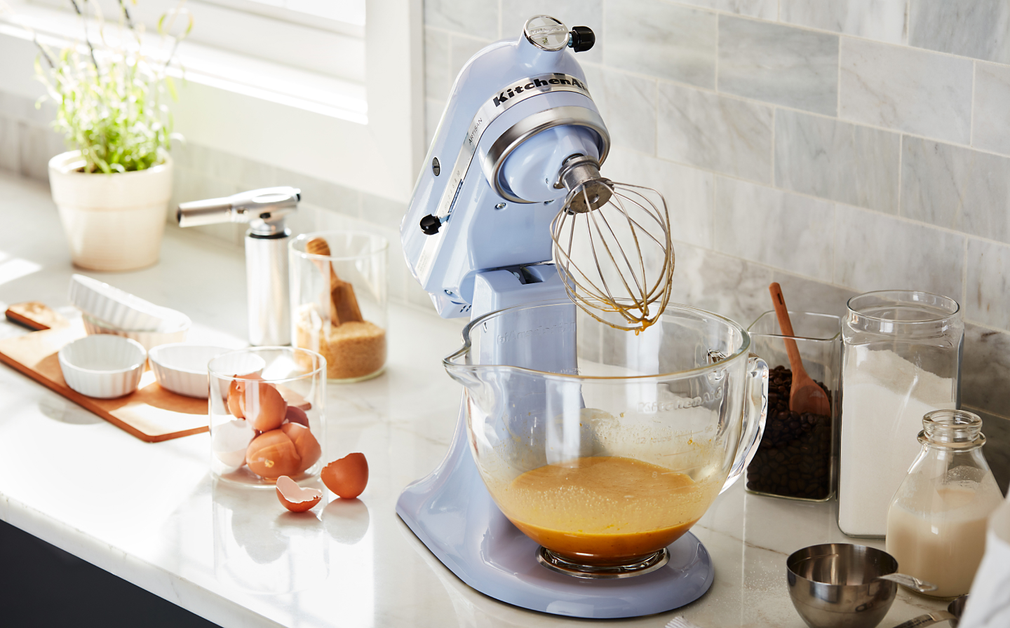 A blue KitchenAid® stand mixer