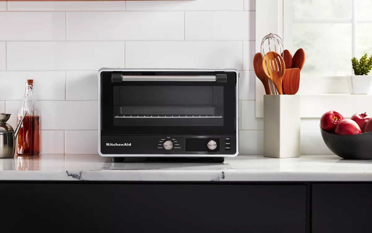 https://kitchenaid-h.assetsadobe.com/is/image/content/dam/business-unit/kitchenaid/en-us/marketing-content/site-assets/page-content/blog/how-to-cook-bacon-in-a-toaster-oven/Thumbnail.jpg?wid=1200&fmt=webp