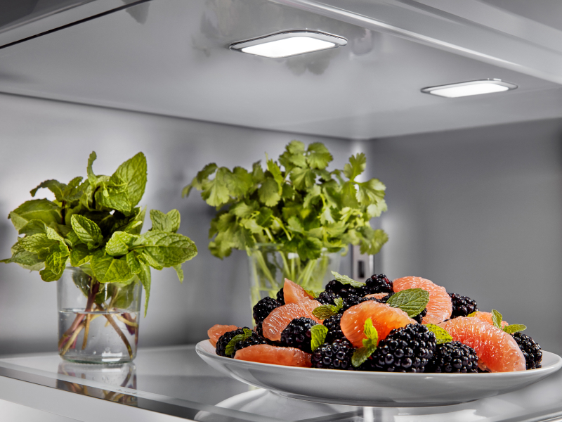 A closeup of an interior shelf of a KitchenAid® refrigerator.