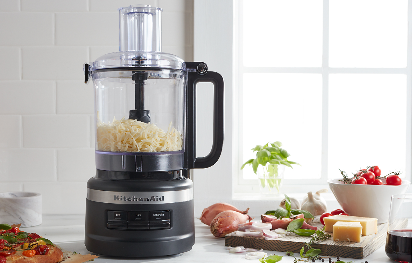 Is there a grater attachment on a food processor, to shred cheeses, etc.? -  Quora