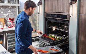 Wall ovens with top grill