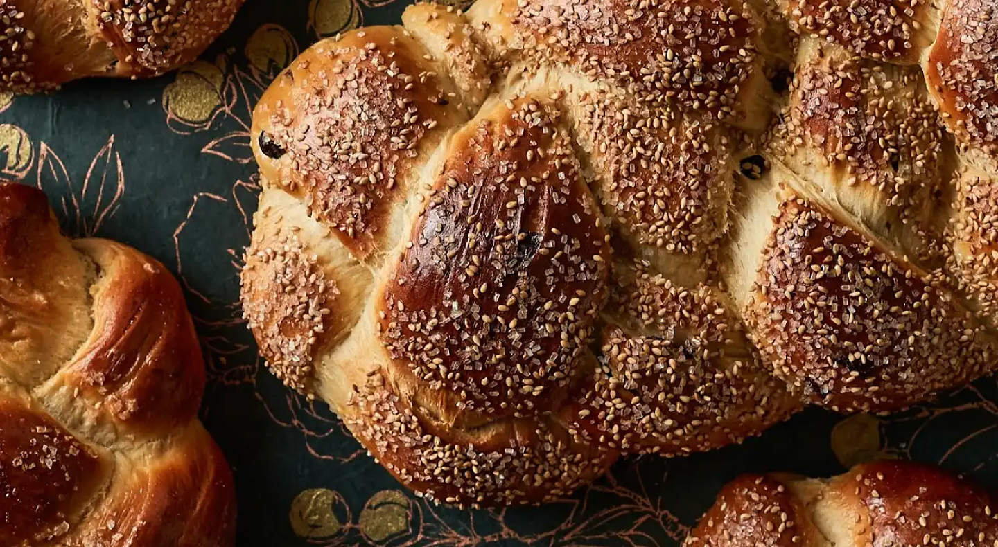 Close-up of challah bread with sesame seeds
