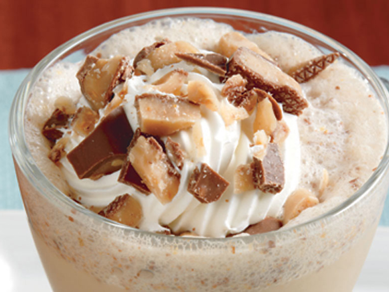 Frozen coffee topped with toffee pieces