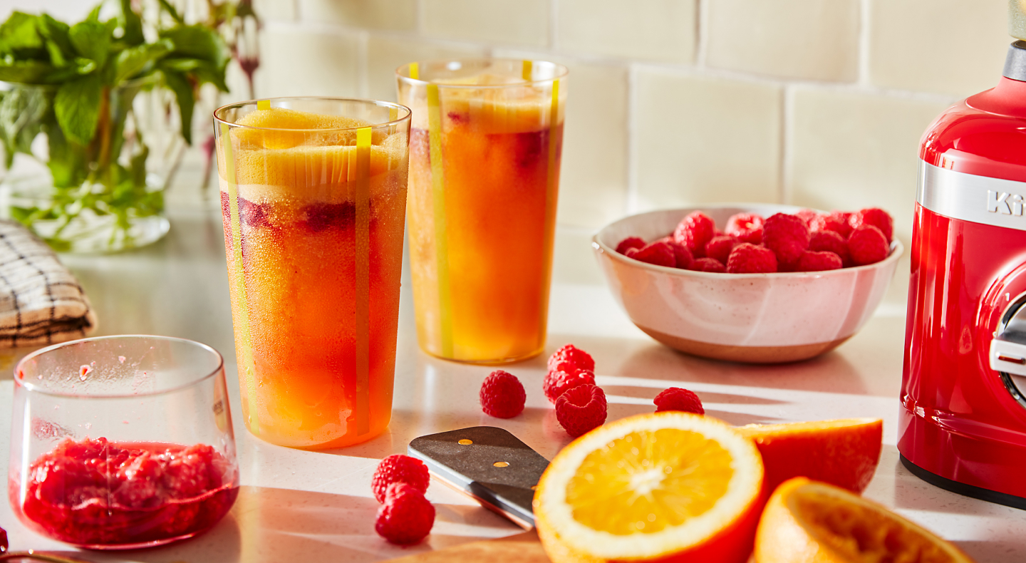 Frozen drinks with raspberries and oranges
