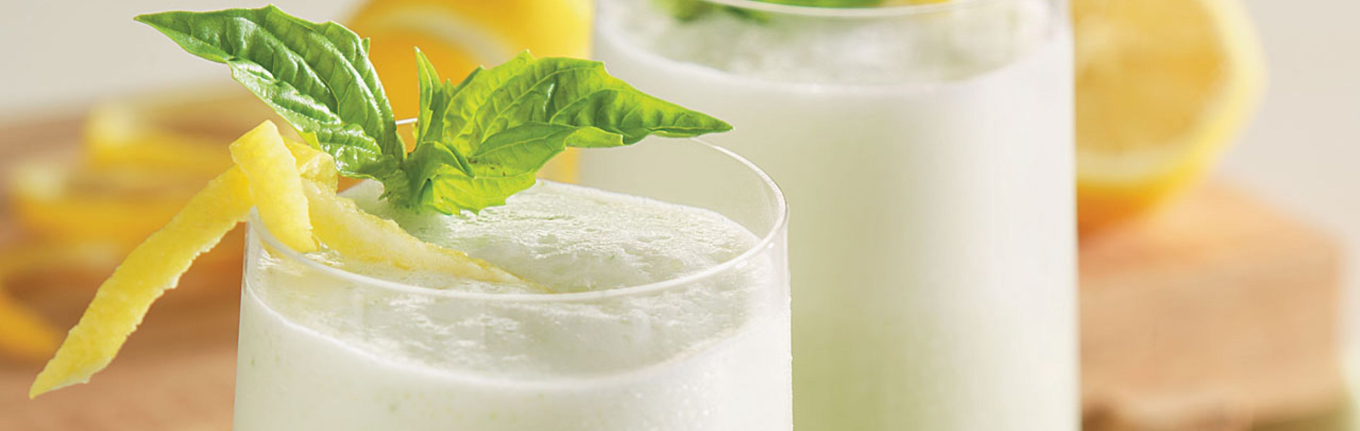 Frozen lemonade with candied citrus and fresh basil