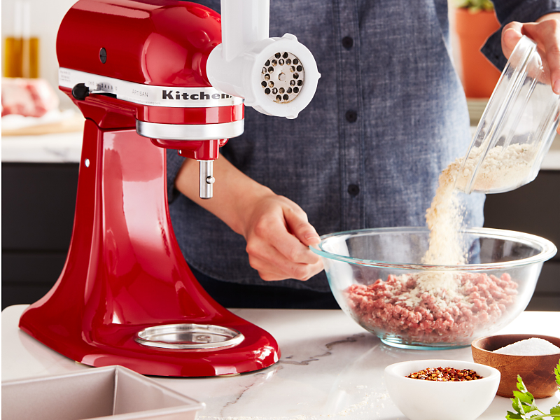 Red KitchenAid® stand mixer with Meat Grinder Attachment