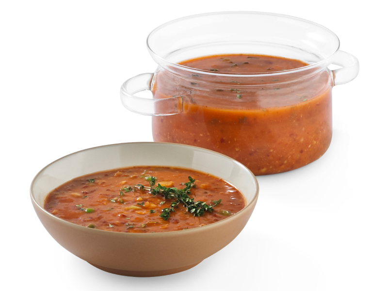 A bowl of garnished blender salsa