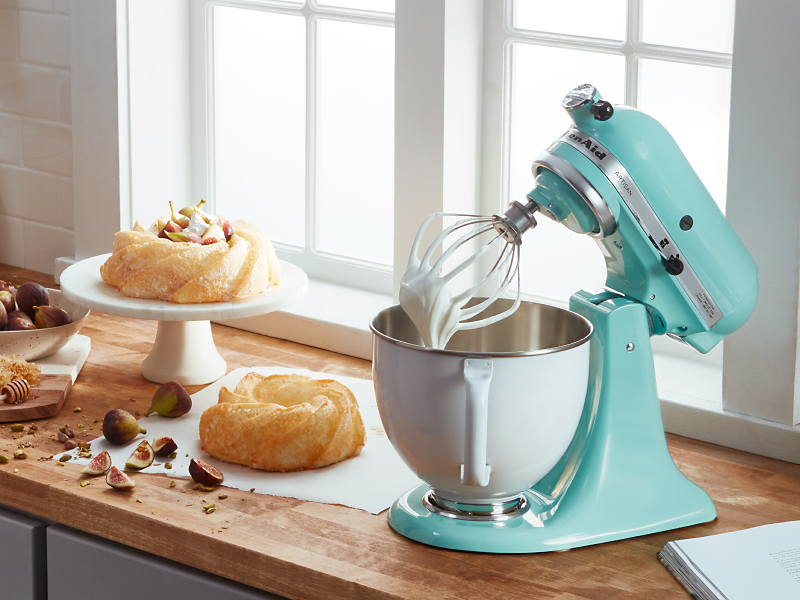Pastries next to a teal KitchenAid® stand mixer 