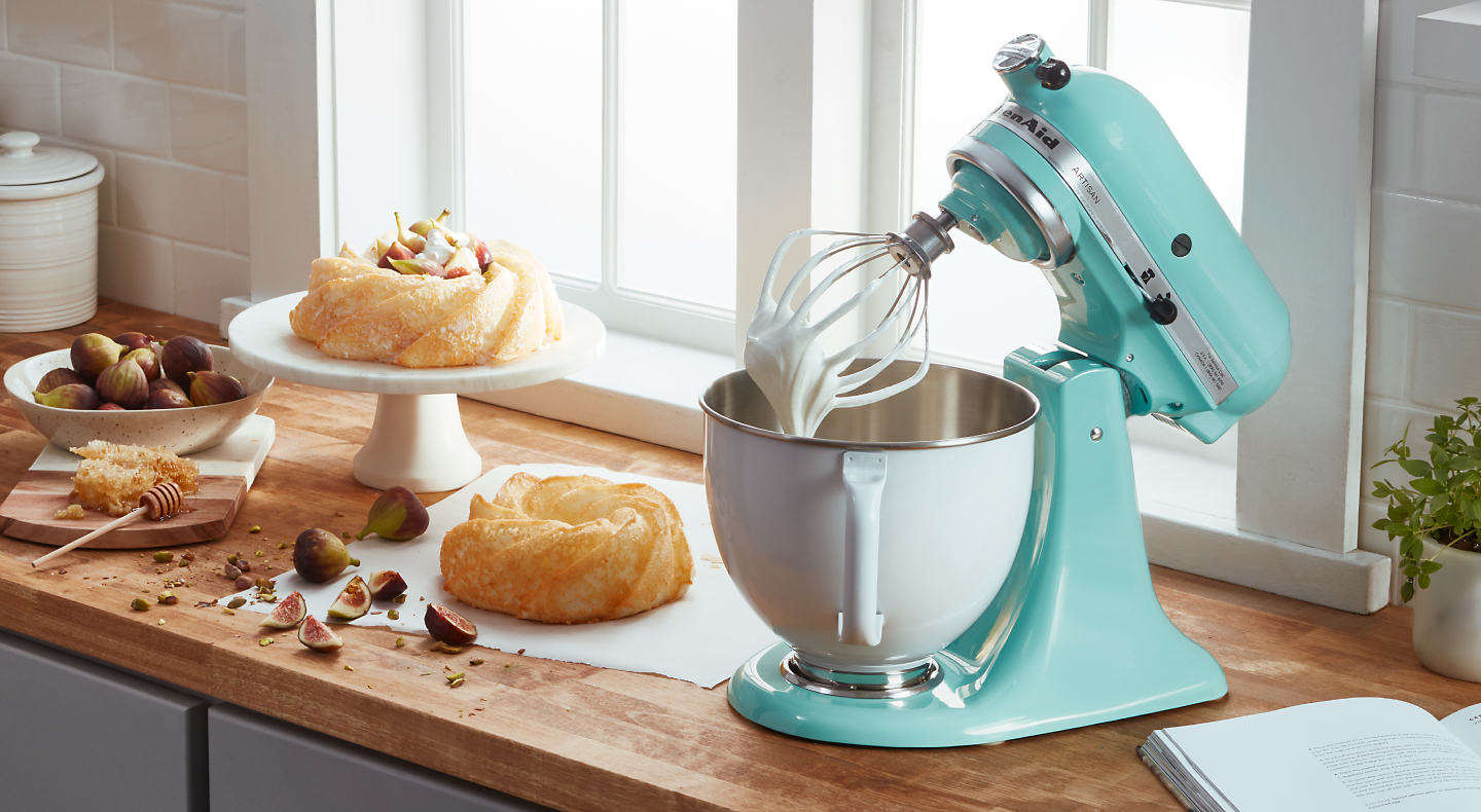 Pastries next to a teal KitchenAid® stand mixer 