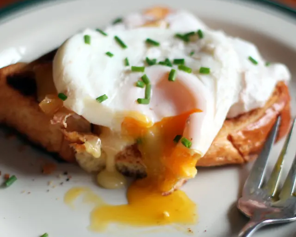 Close up of poached egg on toast