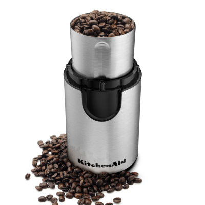 On open coffee grinder with beans filled to the top