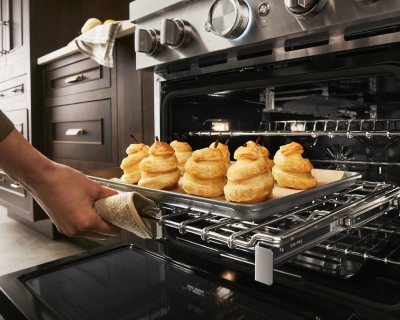 Popovers being removed from oven