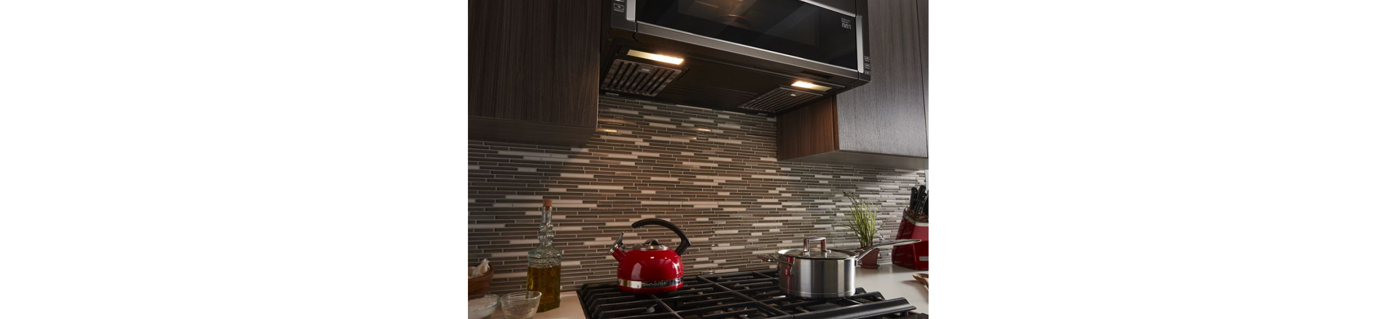 Help clear the air with a microwave vent hood from KitchenAid.