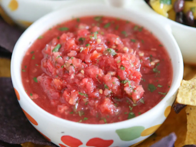 Tomato salsa in white bowl