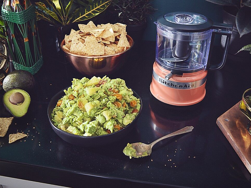 KitchenAid® food processor with guacamole and chips