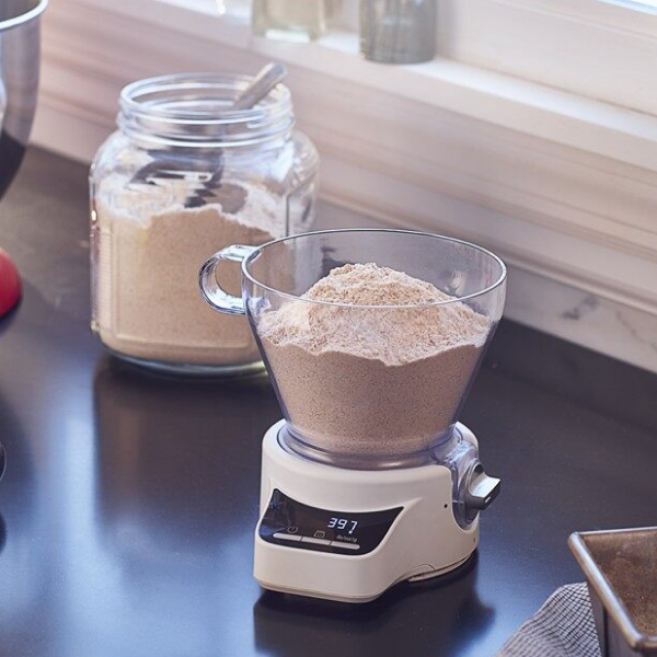 Fine ground grains in the KitchenAid® sifter and scale attachment.