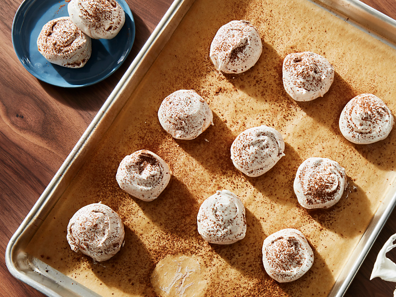Meringue cookies topped with cocoa powder