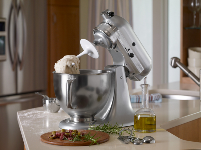 Silver KitchenAid® stand mixer with the dough hook accessory