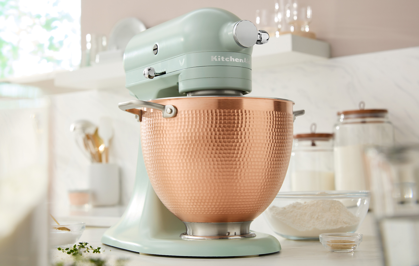Teal KitchenAid® stand mixer with copper mixing bowl