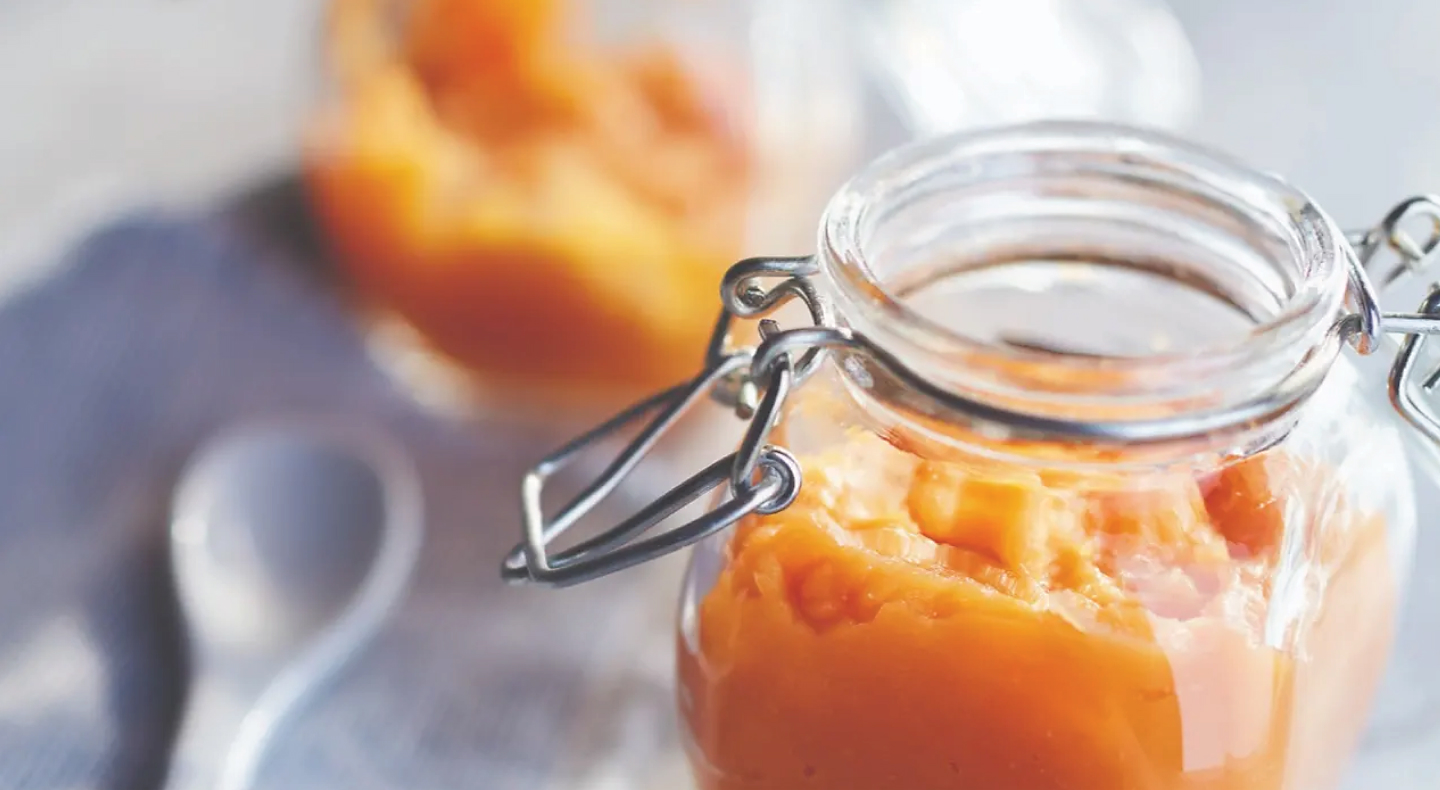 Homemade pumpkin puree in glass jar