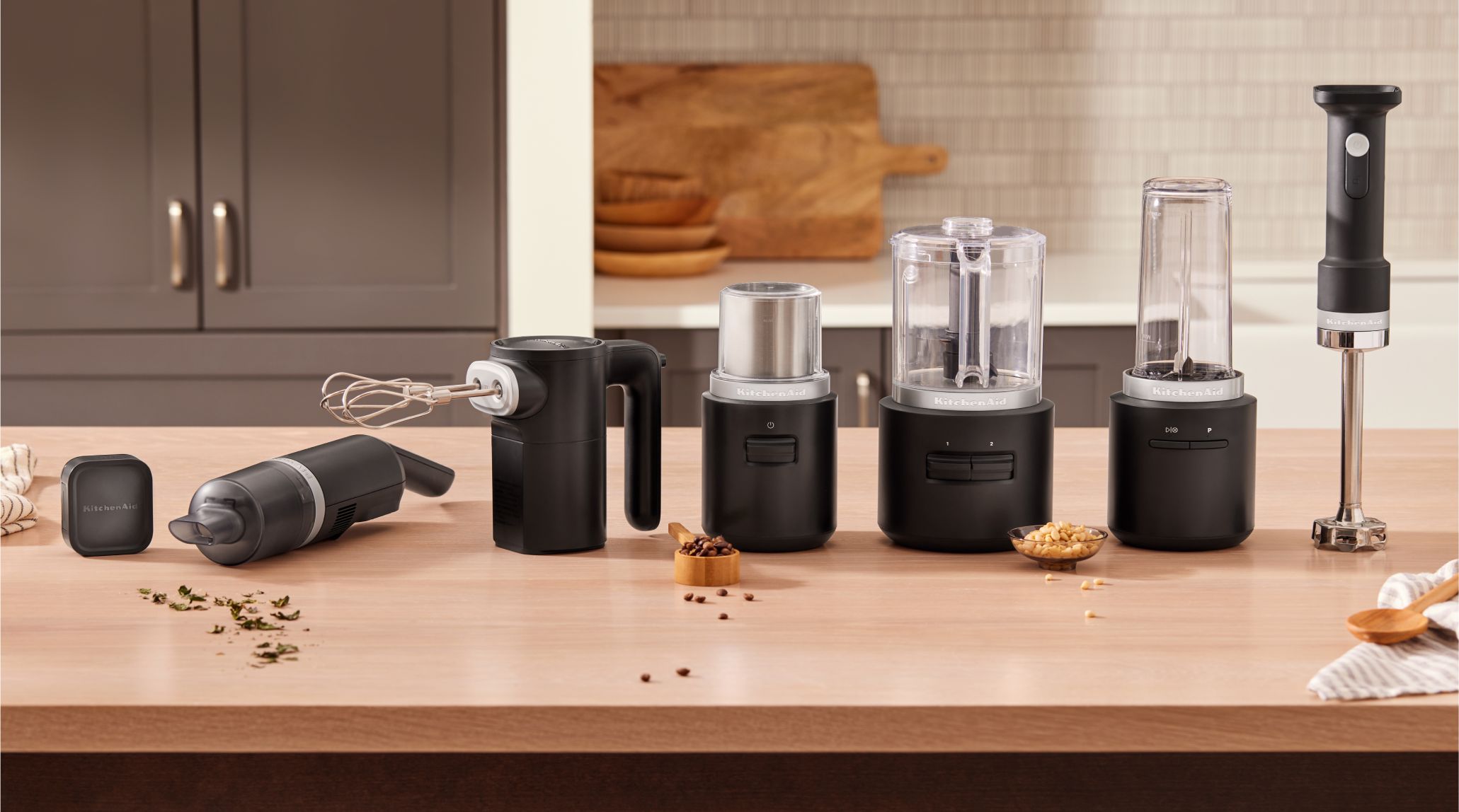 The KitchenAid Go™ Cordless lineup of appliances on a kitchen counter.