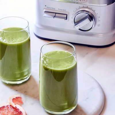 Two glasses of homemade green tea smoothies.