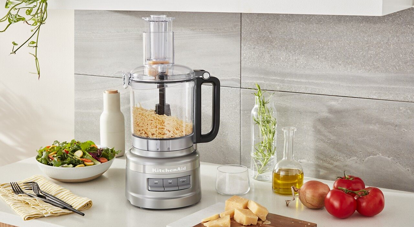  Freshly grated cheese in KitchenAid® food processor