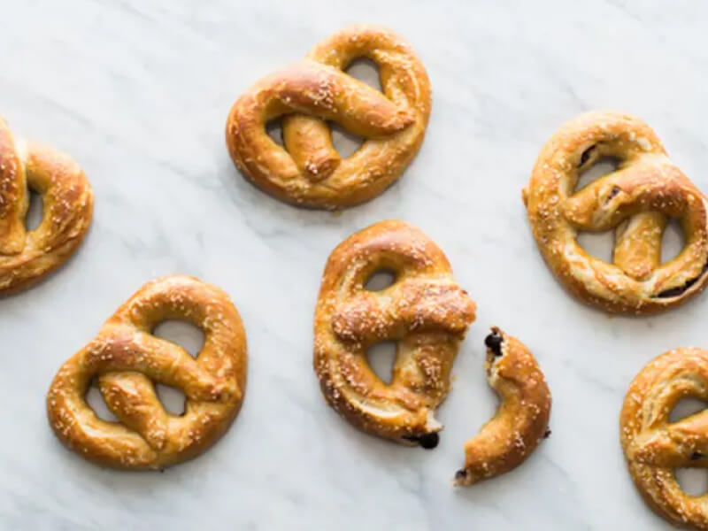 Baking sheet with nutella stuffed pretzels