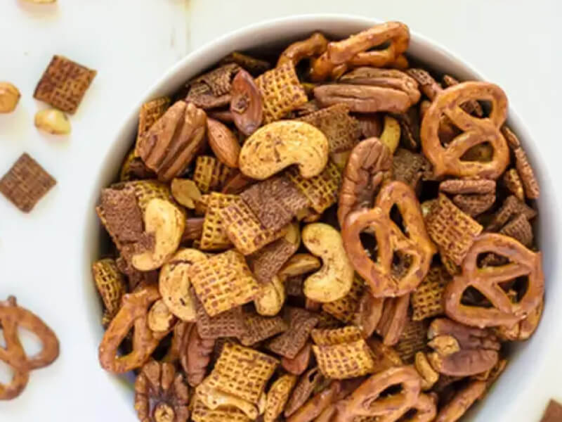 Snack mix in white bowl