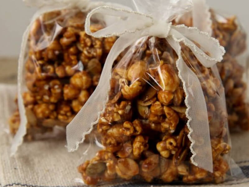 Popcorn in clear bags tied with ribbon