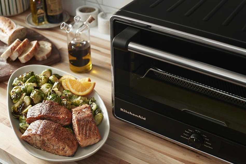 Test Air fryer vegetables and salmon next to a KitchenAid® Countertop Oven with Air Fry