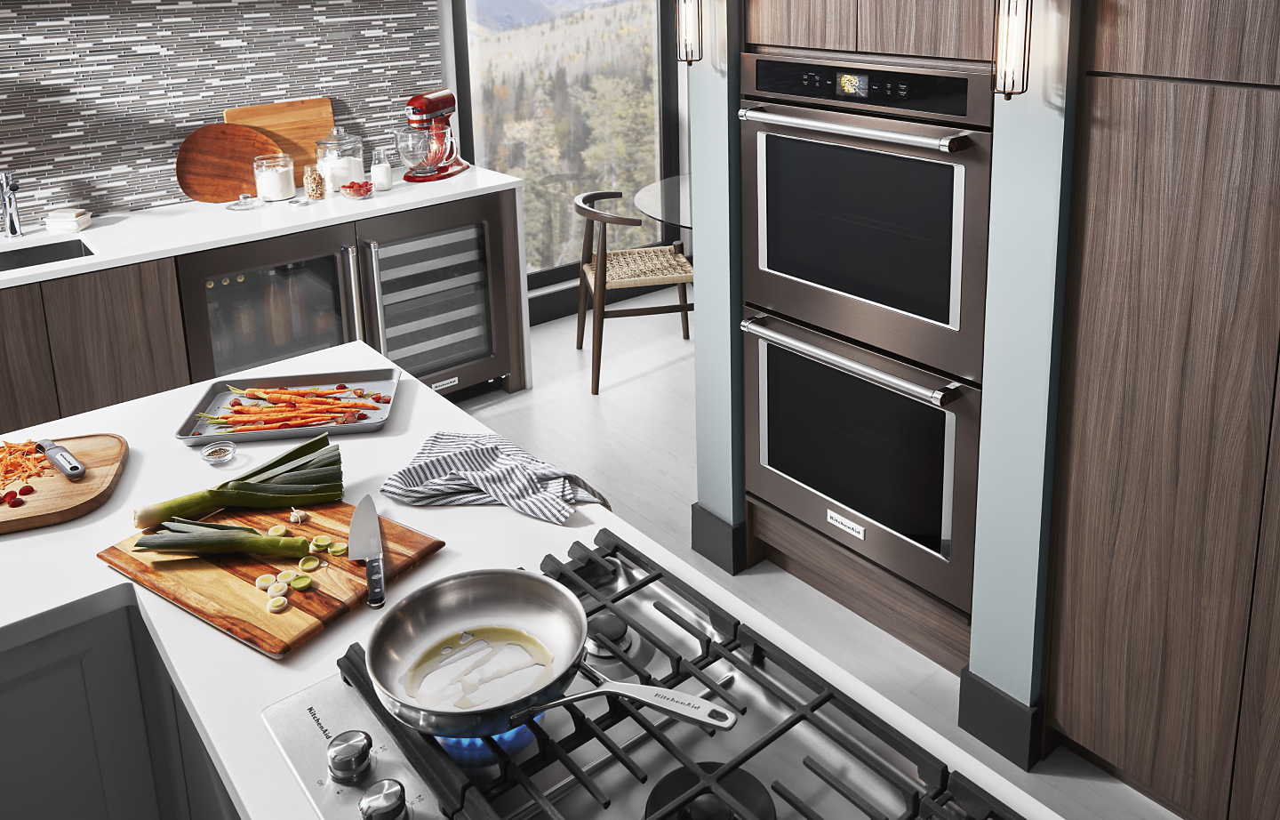 Black KitchenAid® double wall oven inside a sleek and modern kitchen