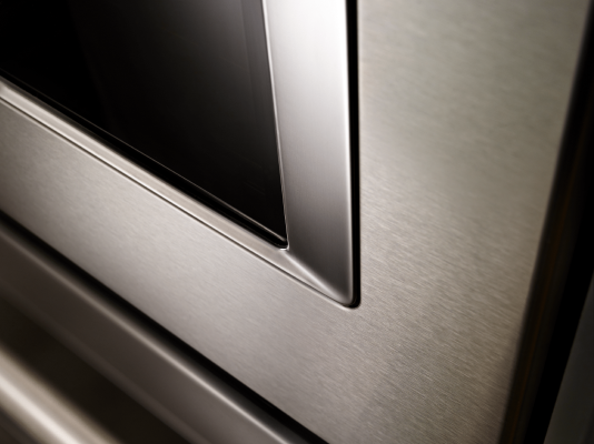 Close up image of an oven with stainless steel finish