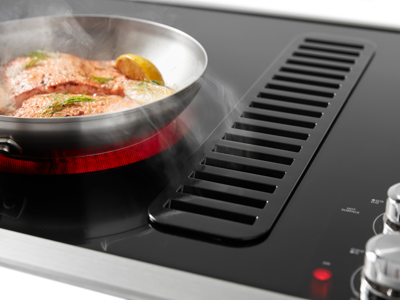 A downdraft electric cooktop