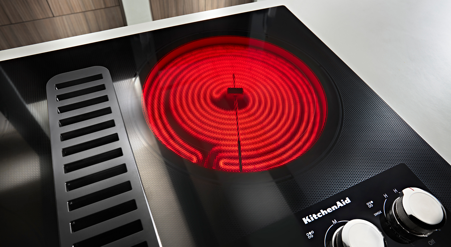 An active element on a KitchenAid® cooktop