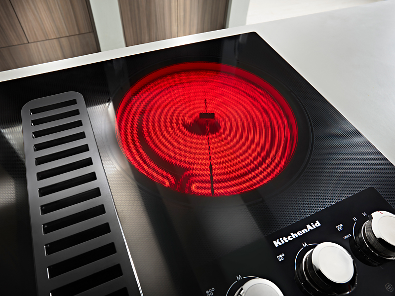 An active element on a KitchenAid® cooktop