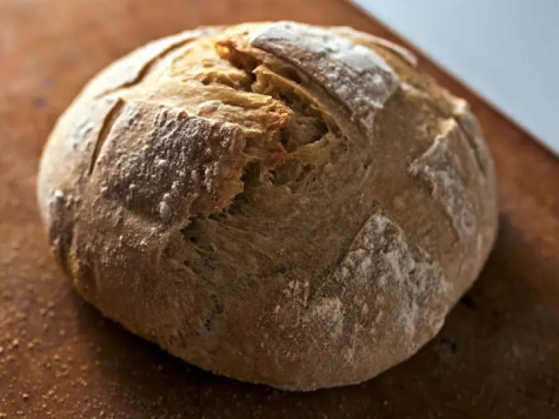 A homemade loaf of sourdough bread.