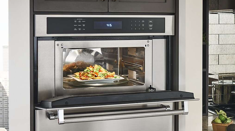 Nachos inside a stainless steel built-in microwave