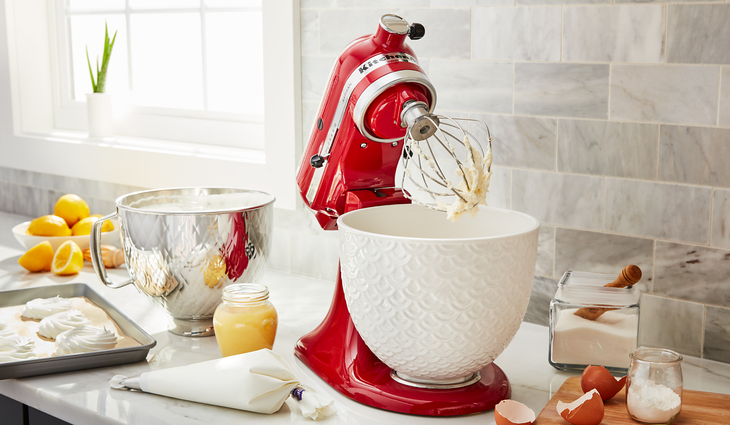 KitchenAid® stand mixer with wire whip and meringue ingredients