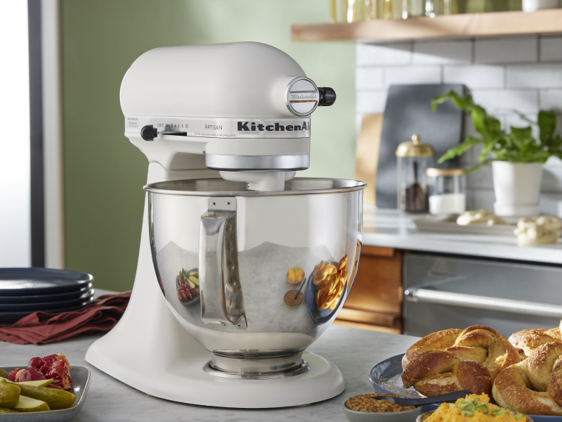 KitchenAid® stand mixer with homemade rolls on counter