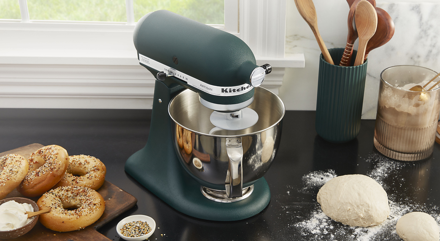 KitchenAid® stand mixer with dough and homemade bagels