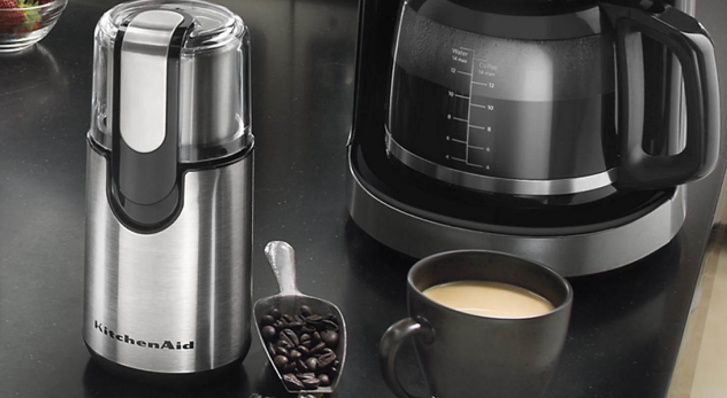 A KitchenAid® blade coffee grinder in a modern kitchen setting