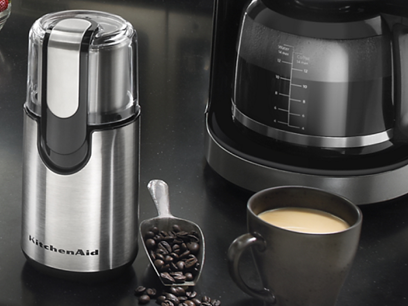 A KitchenAid® blade coffee grinder in a modern kitchen setting
