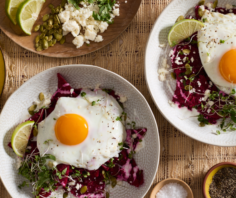 Chilaquiles on a bed of beet salsa