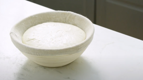 Dough in a proofing basket.