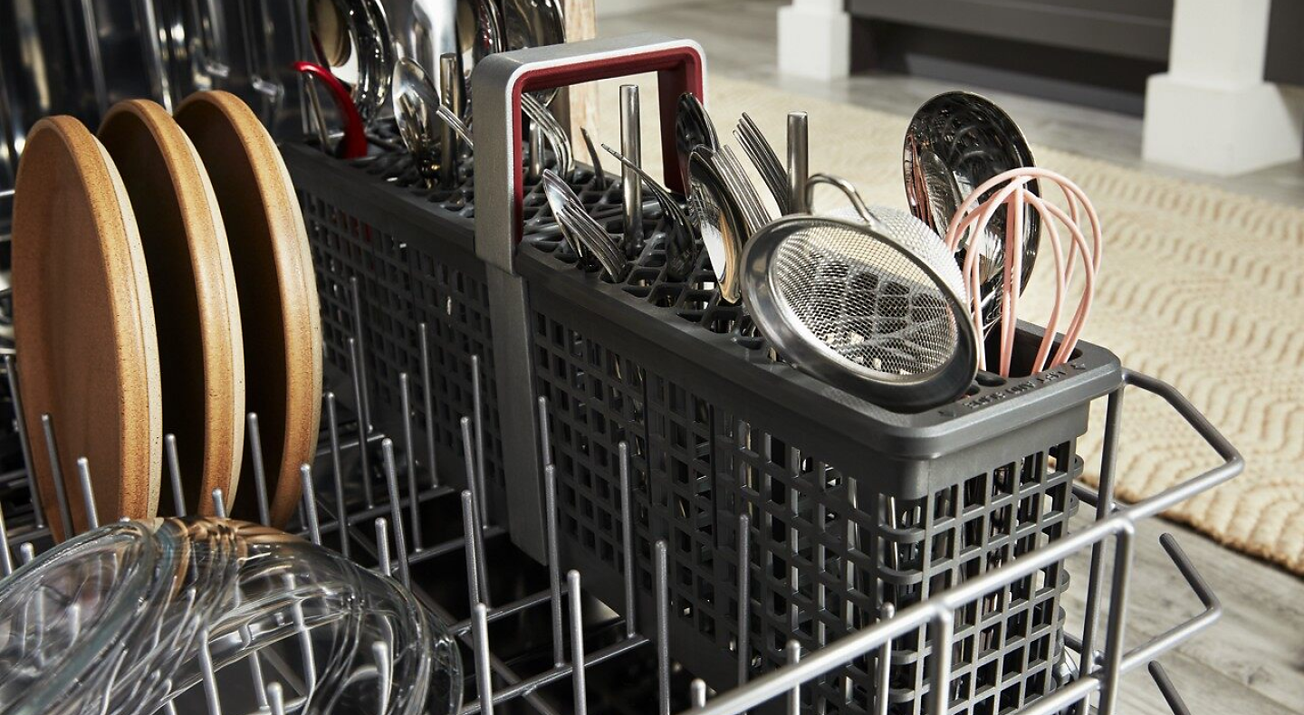 A closeup of the bottom rack of a KitchenAid® dishwasher.