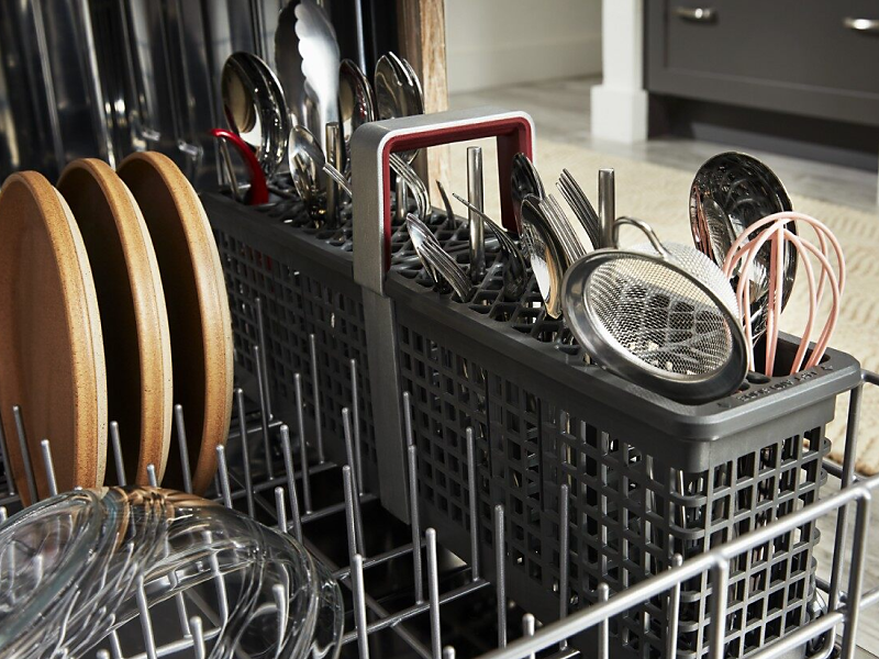 A closeup of the bottom rack of a KitchenAid® dishwasher.