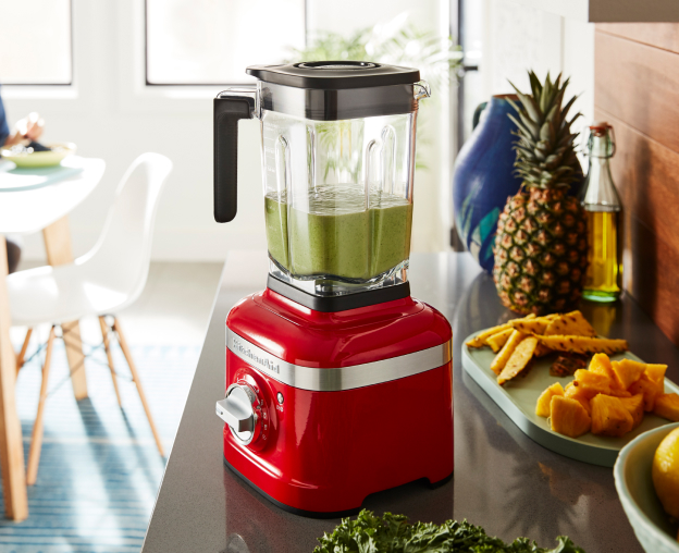 KitchenAid® blender on a counter with green smoothie